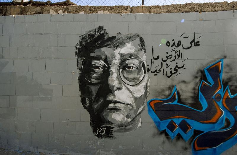 poet 2 Darwish on wall
