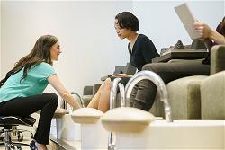 woman-having-a-pedicure-with-a-nail-technician-in-2022-03-04-02-46-07-utc